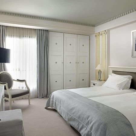 Готель Njv Athens Plaza Номер фото A room at the Hotel de la Paix